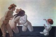 three women and a young girl playing in the water
